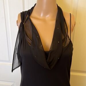 Forever21 black cocktail dress. SizeM Accent at bodice and back. 2 tier hem